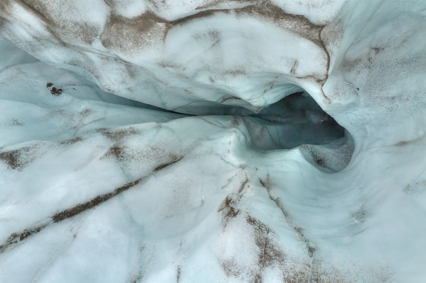 The blue interior of an ice cave
