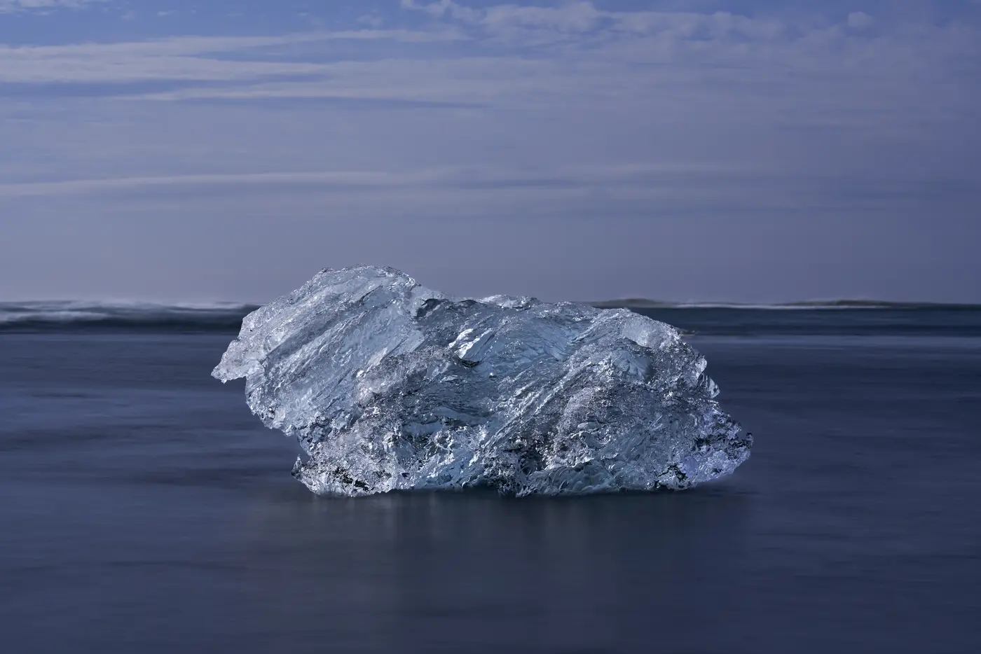 An iceberg in still water