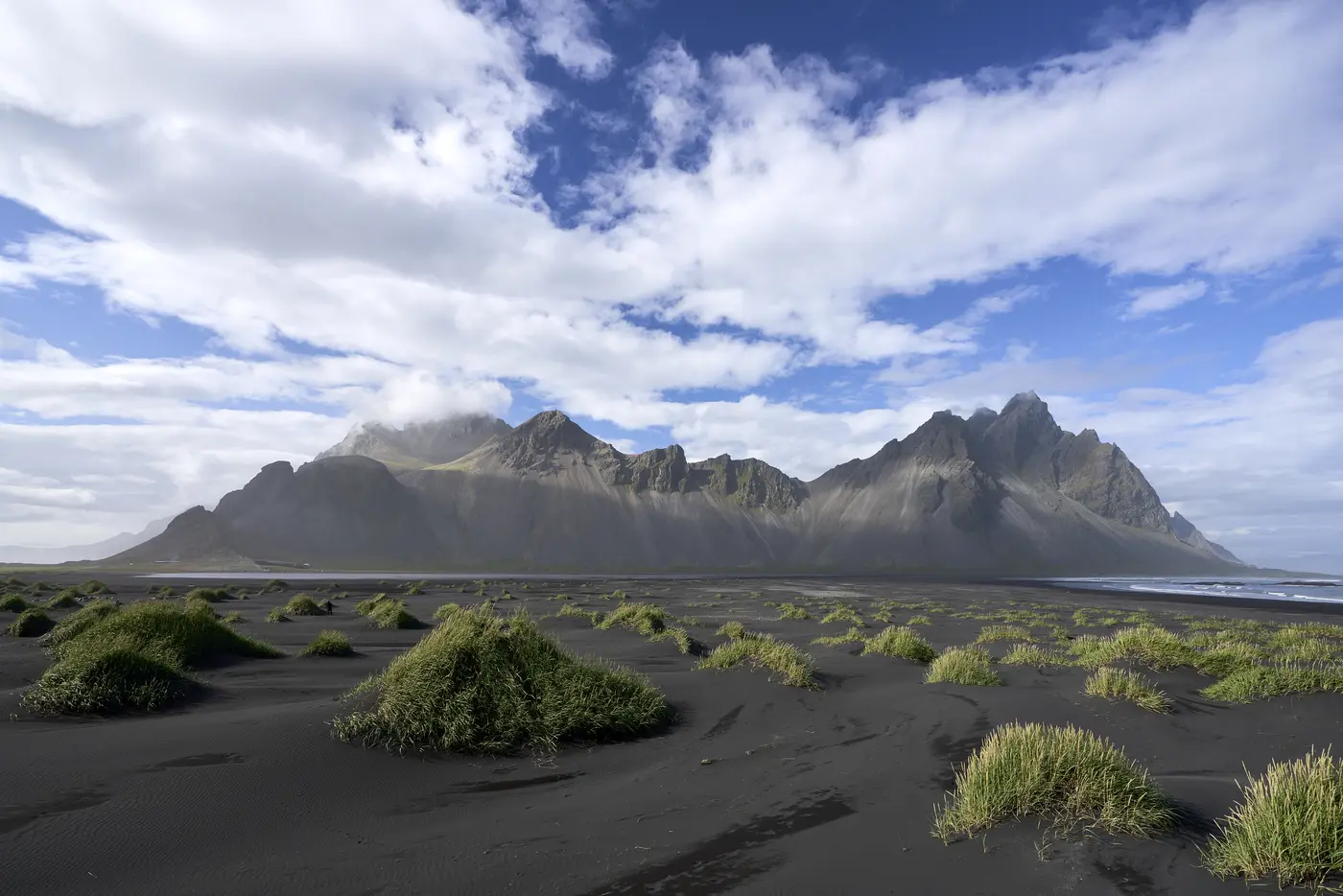 The jagged silhouette of Vestrahorn above black sand