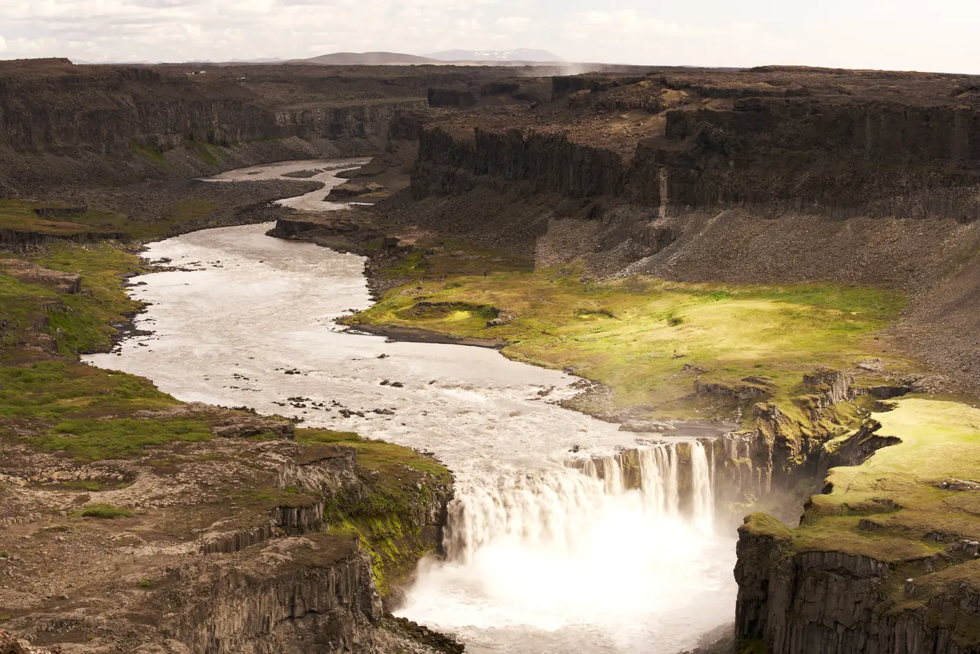 A broad waterfall in a wide curve