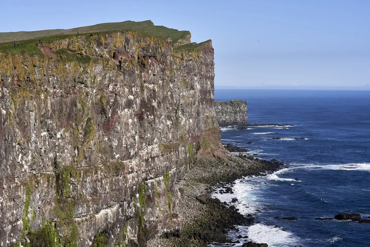 Coastal cliffs dropping steeply to the sea