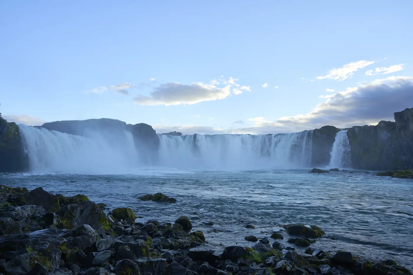 A waterfall in warm evening light
