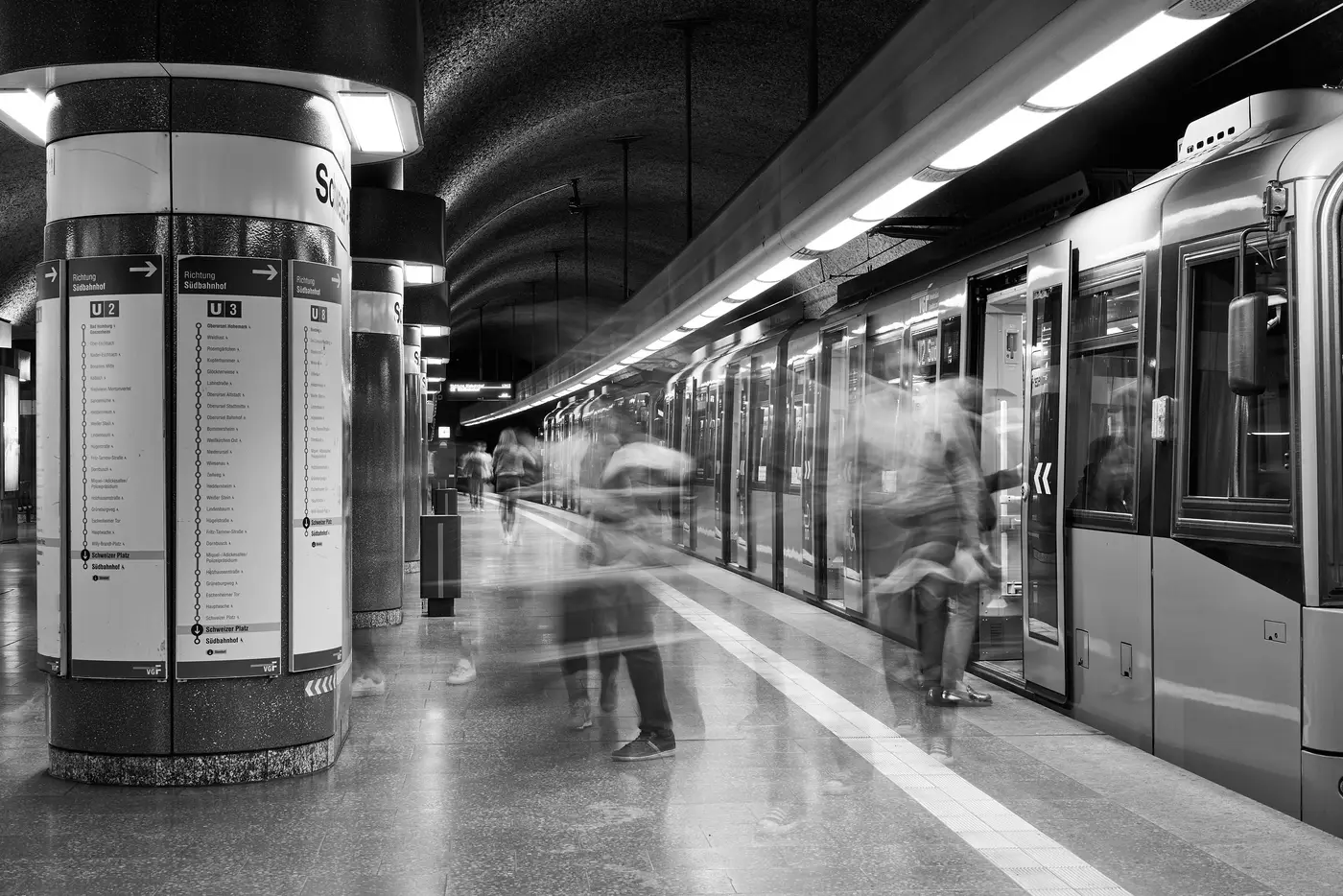 An underground station in black and white